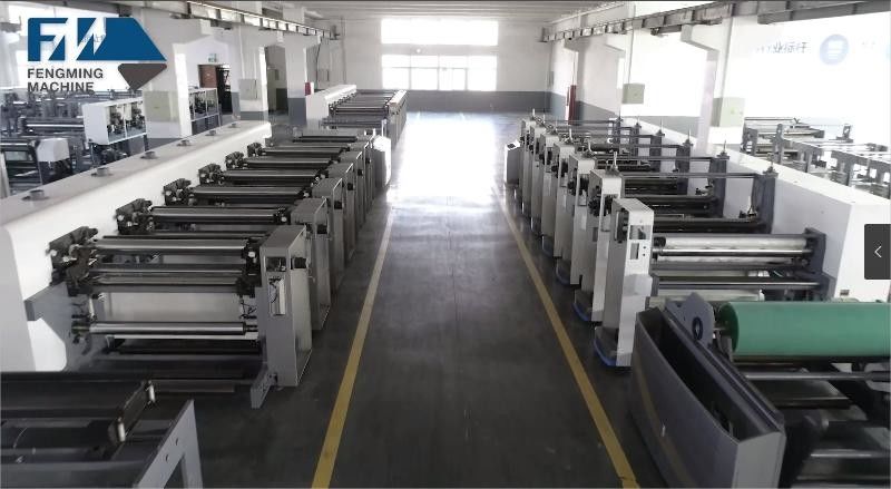 Sistema de guía web y carga/descarga automática para la máquina de impresión de tipo unitario